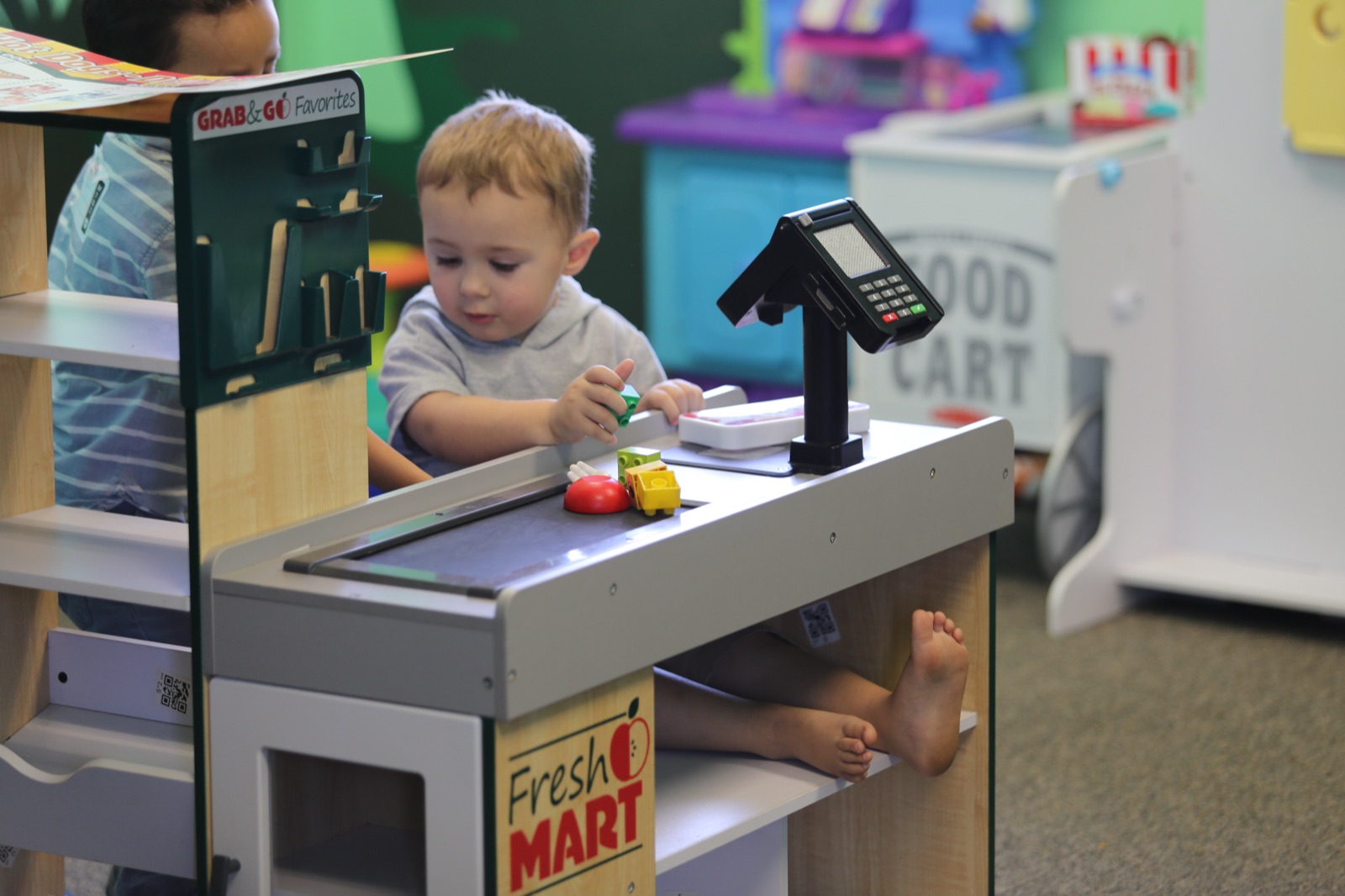 Kids playing and learning at Harvest Kids